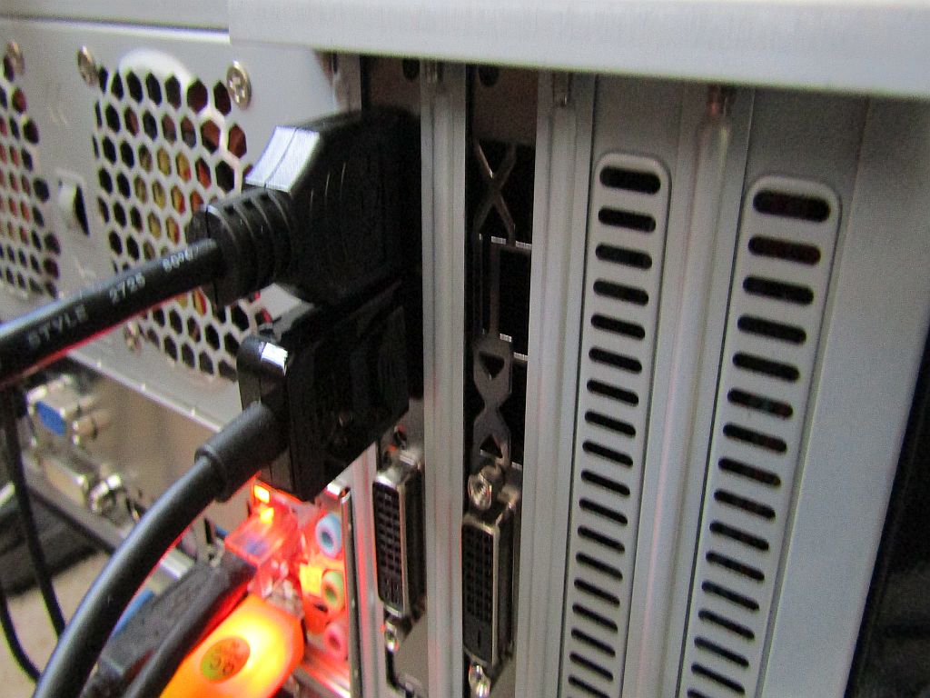 The back of desktop PC showing the ports of an AMD Radeon graphics card.