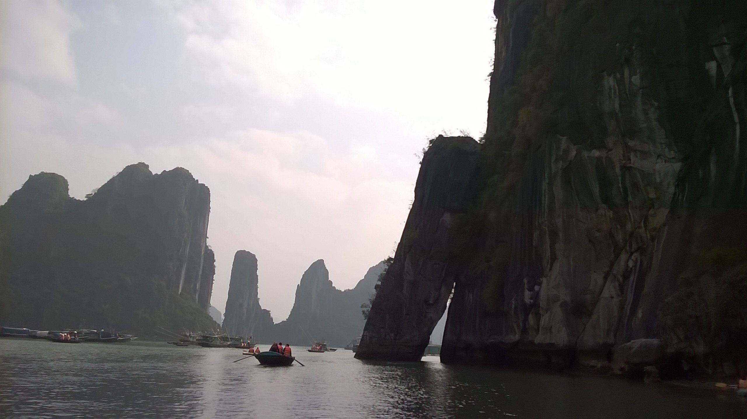 These rock formations are like 'sleeping giants' in the calm waters of the bay