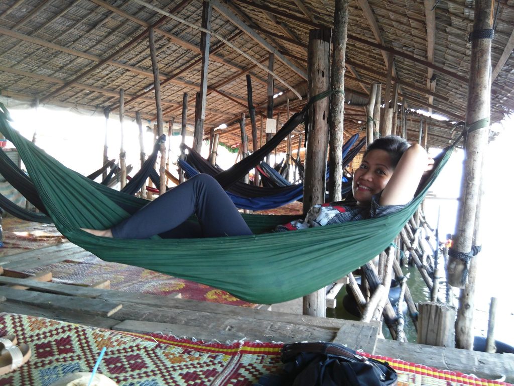 Ruby snuggles in one of the hammocks while in West Baray.